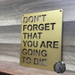 Bad Dog Metalworks motivational sign "Don't forget that you are going to die" in a Spanish gold finish