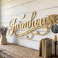 Metal 'Farmhouse' script sign in Spanish Gold