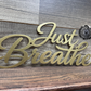 Just Breathe Metal Sign