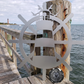 Lighthouse and Ship Wheel
